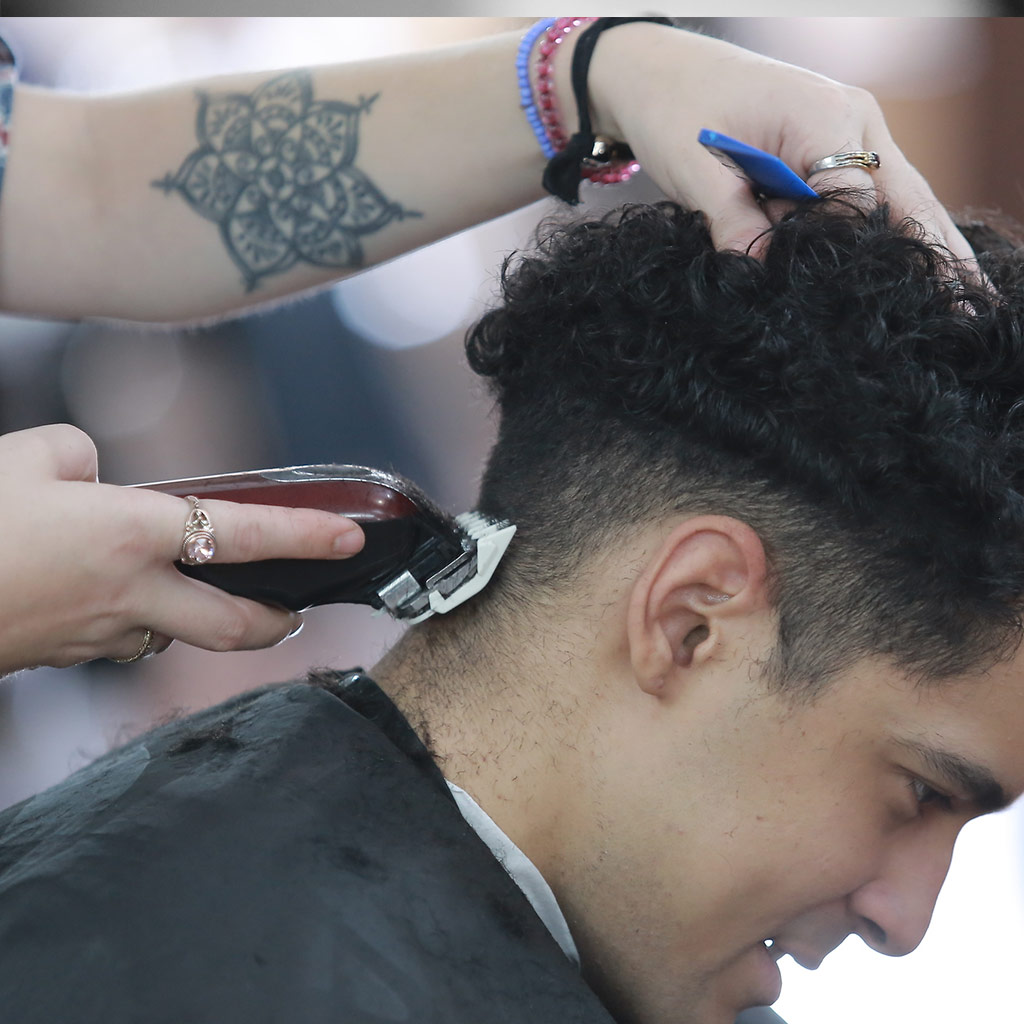 Barber Student Giving a haircut